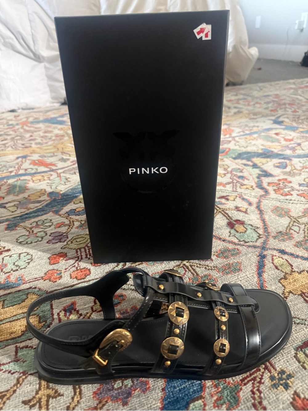 Pinko Black Leather Strappy Sandals with Gold Stud Accents